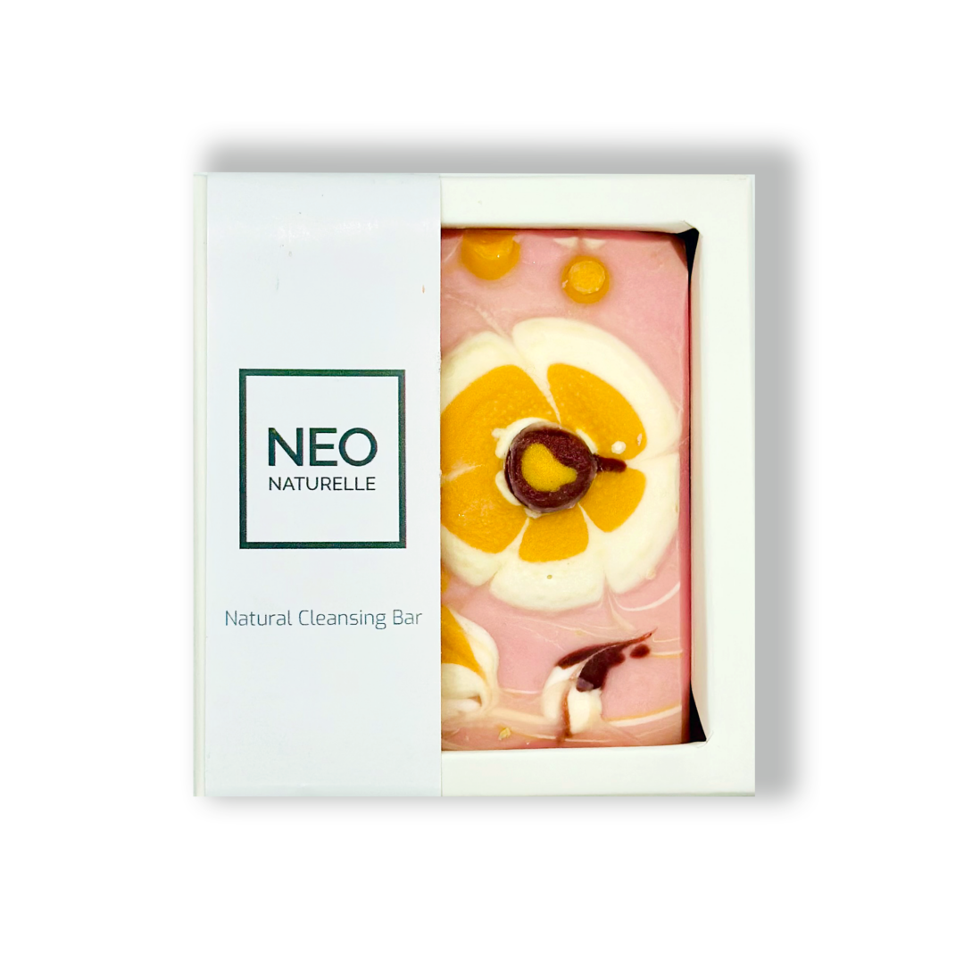 Neo Naturelle Hawaiian Plumeria Cleansing Bar in elegant packaging, showcasing a vibrant floral design