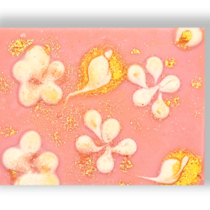 Neo Naturelle Natural Cleansing Bar with a pink floral design and gold accents.